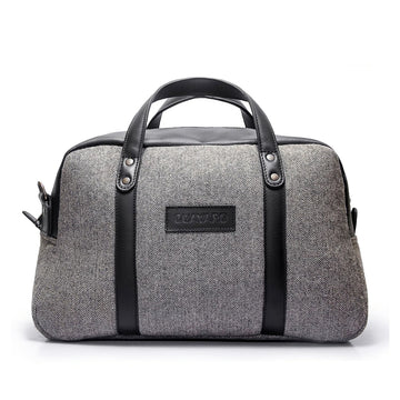 The Weekend Travel Bag is made from full grain leather with both smooth and pebbled textures for a luxurious look and feel